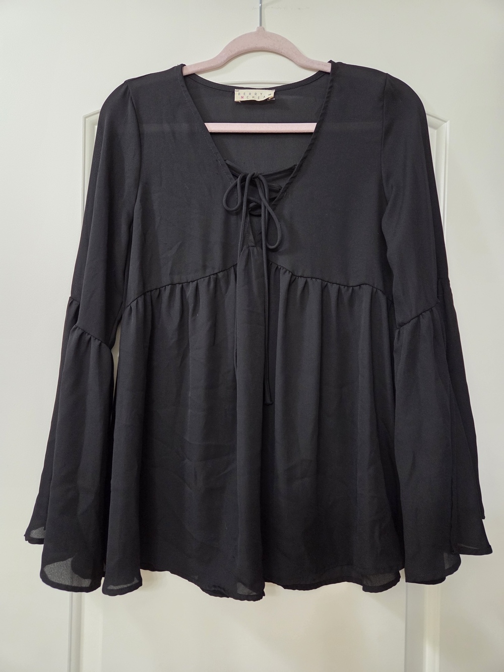 Black Tie-Neck Bell-Sleeve Blouse by